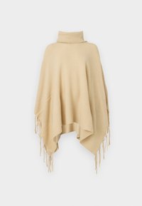 Poncho de malha bege com design de gola alta, apresentando textura canelada e bordas franjas, proporcionando um caimento solto e um ajuste confortável.