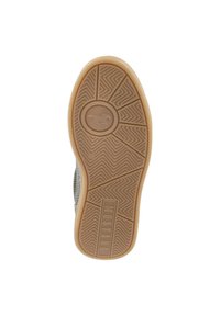 Semelle de chaussure avec un design de semelle à motif, incorporant un logo circulaire, en caoutchouc beige ; présente un panneau latéral gris avec un détail de marque.