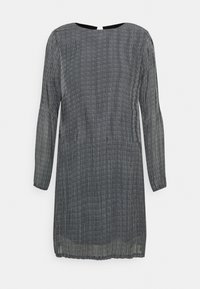 Svart och vit långärmad klänning med en texturerad mönster, rund halsringning och en midjelång design, med en detalj av en baköppning.