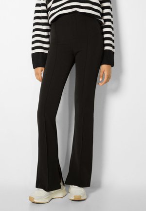 WITH SPLIT HEMS - Pantaloni - black