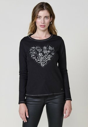 T-shirt nero a maniche lunghe con design a cuore floreale, caratterizzato da accenti argentati, scollatura rotonda e cuciture a contrasto all'orlo.