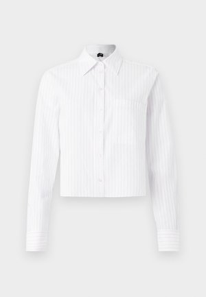 White cropped button-up shirt with light blue vertical stripes, long sleeves, single chest pocket, and classic collar. Cotton blend fabric.