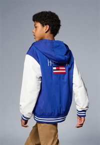 Tommy Hilfiger HOODED GRAPHIC - Übergangsjacke - wedge blue