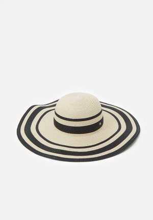 Chapeau de soleil à larges bords avec des rayures alternées noires et beiges tissées en motif circulaire.
