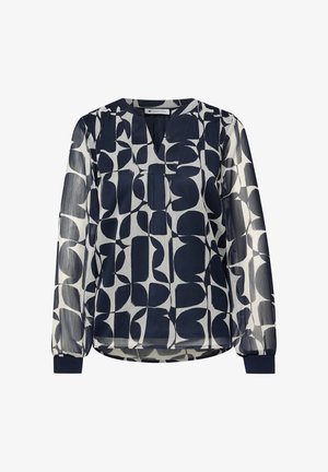 Langærmet marineblå og hvid bluse med abstrakt geometrisk mønster, V-hals, let gennemsigtigt stof og elastiske ærmekanter.