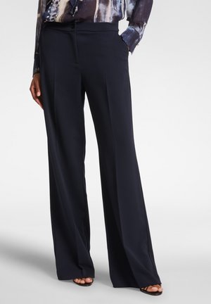 IN FLUIDO - Pantaloni - blu