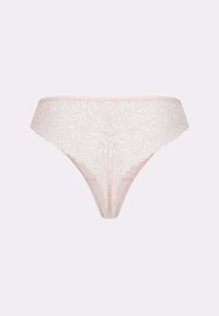 String en dentelle de couleur rose doux, avec broderies florales, bords festonnés et finition lisse. Design léger et délicat.