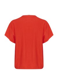 Rotes Kurzarmoberteil aus leichtem Stoff. Mit rundem Ausschnitt und Spitzenbesatz, in lässigem, kastigem Schnitt. Glatte Textur, einfarbig.