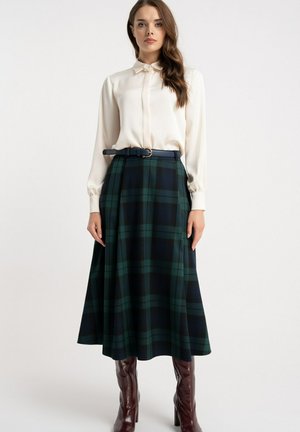 - Spódnica trapezowa