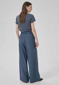 My Essential Wardrobe VITTAMW WIDE - Trousers - dark slate w stripe