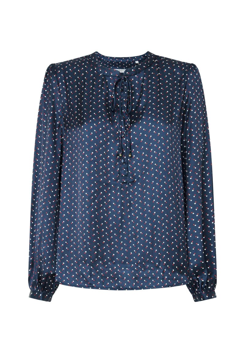 Blusa navy en tejido ligero con puntos rojos y blancos, mangas largas y cuello con lazo. Textura suave con detalle de botones en la parte delantera.