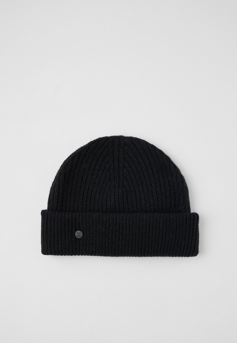 Μαύρο πλεκτό σκουφί με ριχτή υφή και διπλωμένο στρίφωμα. Διαθέτει ένα μικρό, στρογγυλό λογότυπο στο μπροστινό μέρος.