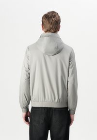 Calvin Klein - Kurtka przeciwdeszczowa