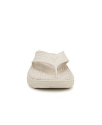 Tongs en caoutchouc beige avec une semelle texturée présentant des motifs en spirale, une sangle en forme de Y et un logo surélevé sur la sangle supérieure.