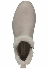 Botte de cheville beige clair en cuir lisse avec une douce bordure en fausse fourrure. Dispose d'une fermeture éclair sur le côté pour un enfilage facile et d'un design à bout rond.