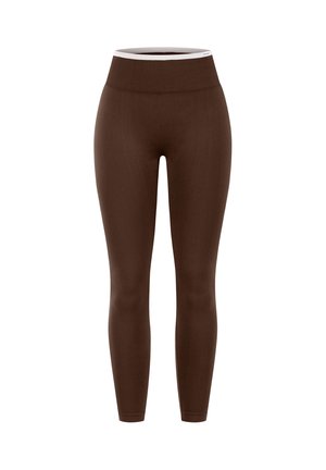 Leggings marrones de cintura alta, sin costuras, con una cinturilla acanalada que presenta un pequeño detalle de logo en blanco.