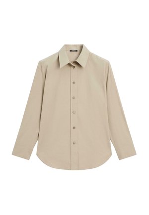 Camicia beige a maniche lunghe con colletto a punta e orlo curvo, esposta su uno sfondo bianco.