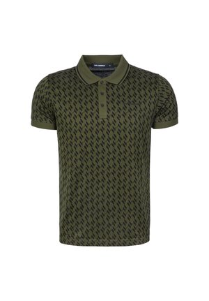 Olivově zelené polotriko s černým geometrickým vzorem, límečkem a trojicovým knoflíkovým páskem. Vyrobeno z texturované bavlněné látky. Krátké rukávy.