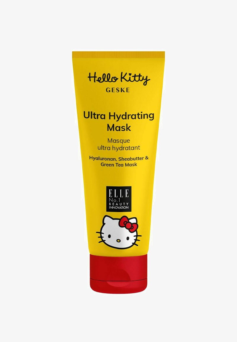 Gul squeeze tube med en rød cap, mærket "Ultra Hydrating Mask," med illustrationer af Hello Kitty og tekst på engelsk og fransk.