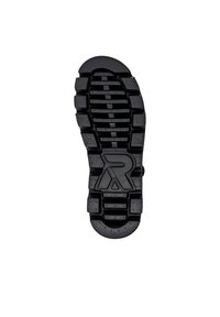 Suela de zapato de goma en negro con surcos y crestas profundos. Presenta un logo en el centro y acentos con patrón. Superficie texturizada para agarre.