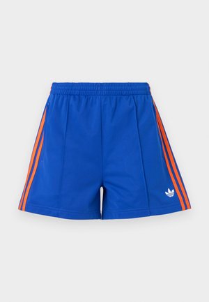 Niebieskie sportowe szorty z elastycznym pasem, pomarańczowymi paskami po bokach i białym logo Adidasa Trefoil na lewej nodze.
