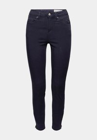 Smal jeans i mörk marinblå denim, med en klassisk femfickdesign, framknäppning och blixtlås vid anklarna. Slät textur.