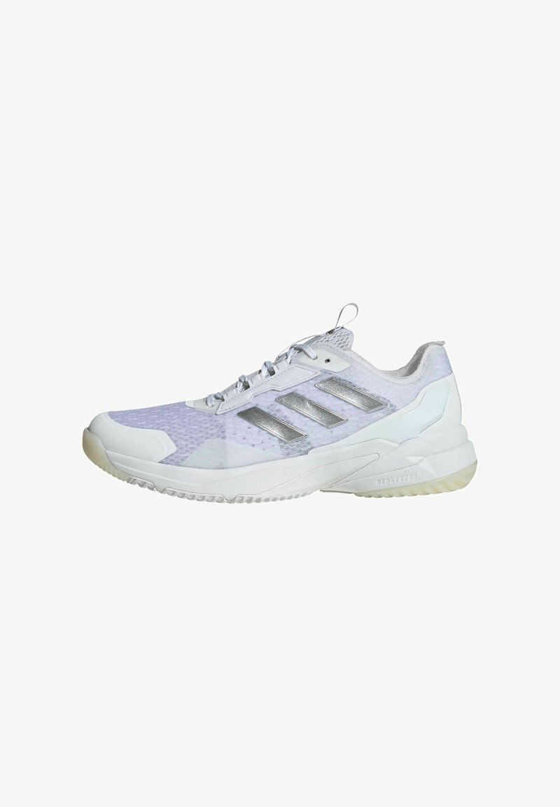 White athletic shoe with silver accents, mesh and synthetic upper, textured sole, and three diagonal stripes on the side.