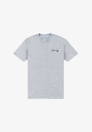 Šedé bavlněné tričko s krátkým rukávem a kulatým výstřihem, na levé části hrudi s malým černým grafickým designem.