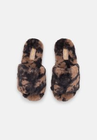Brown and black leopard print fuzzy slippers with a soft, plush texture. Features wide straps and a round toe design.