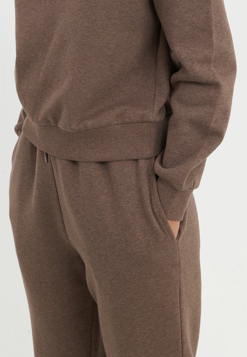 KIZN Pantaloni della tuta da donna in vita alta con coulisse, pantaloni larghi da relax, comodi