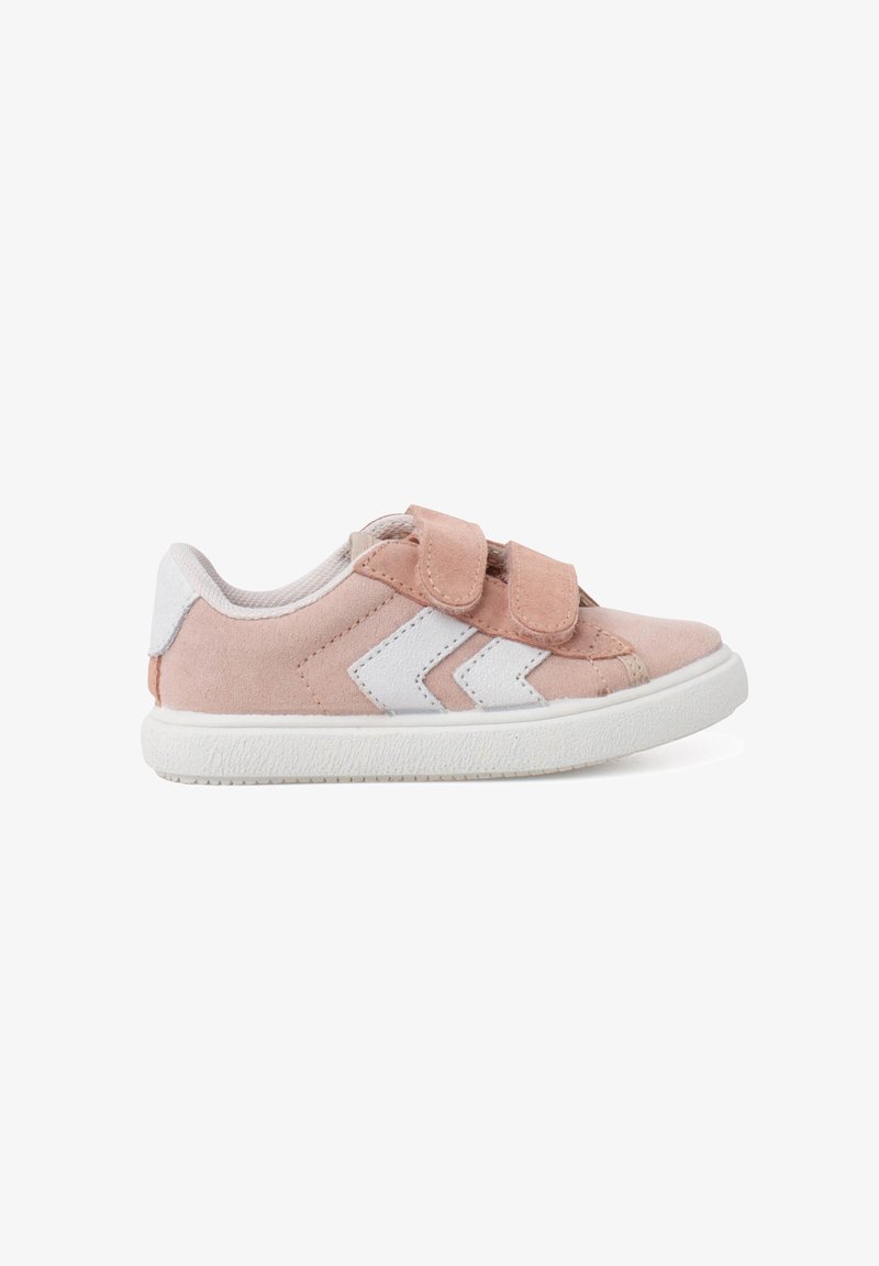 Light pink suede sneaker with white rubber sole, two Velcro straps, and white chevron design on the side. Smooth texture with contrasting accents.