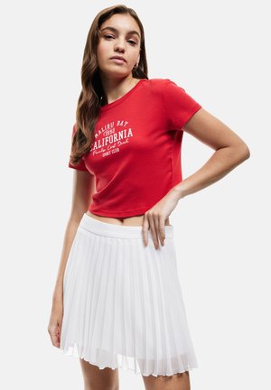 Falda acampanada - white