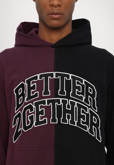 Hooded sweatshirt with a half purple, half black design. Features bold white text "BETTER 2GETHER" across the chest. Cotton blend fabric.