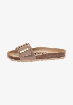 Beige slide sandal with a wide strap, featuring a gold-tone buckle and a cork footbed. Textured rubber sole for traction.