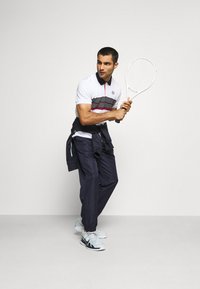 Sergio Tacchini CARSON - Calças de fato de treino - dark blue/white