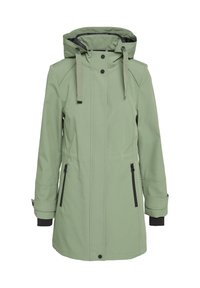 Capa impermeable de color verde claro con capucha. Presenta acentos negros, dos bolsillos con cremallera y un corte holgado. Textura suave.