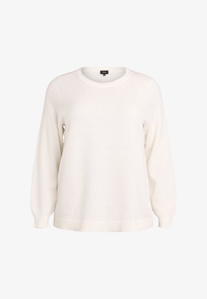 Vit stickad tröja med texturerad yta, långa ärmar och rund halsringning. Har ribbade manchetter och fåll, vilket ger en avslappnad passform.