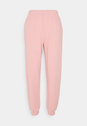 RILEY - Tracksuit bottoms - rosé