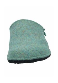 Green felt slip-on slipper with a rounded toe and black rubber sole. Features a small green tag on the side, showing soft, textured fabric.