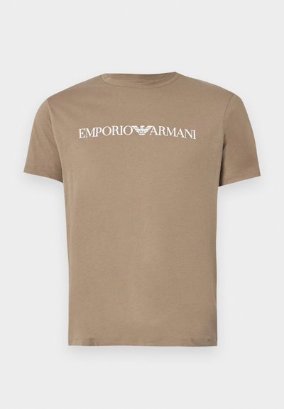 Brown cotton t-shirt with a crew neckline, featuring a white "Emporio Armani" graphic logo across the chest. Short sleeves, smooth texture.