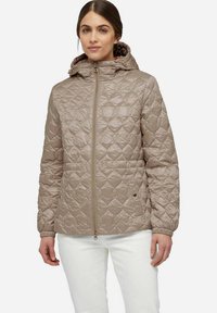 Lichtbeige gewatteerde jas met een capuchon, voorritssluiting en elastische manchetten. Heeft een ruitpatroon en een ingetogen ontwerp voor warmte.