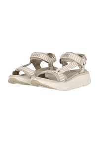 Ljusbeige sandaler med justerbara randiga tygremmar, en vadderad sula och en texturerad yttersula; lämpliga för utomhusaktiviteter.