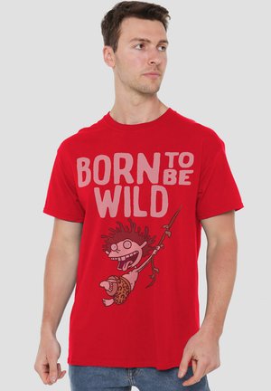 Red cotton t-shirt featuring a large graphic with the text “BORN TO BE WILD” and a cartoon character swinging from a branch.