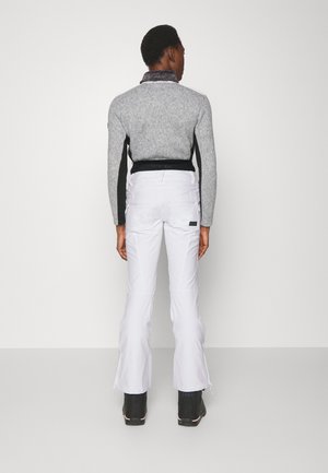 RISING HIGH - Snow pants - white