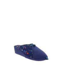 Zueco azul marino sin cordones con patrón floral, parte superior de tela suave, punta redondeada y pequeño lazo decorativo. Suela acolchada y tacón en cuña.
