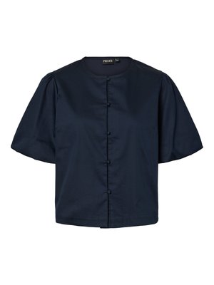 Blouse courte à manches courtes bleu marine foncé avec encolure ronde, boutons recouverts de tissu à l'avant, et manches bouffantes.