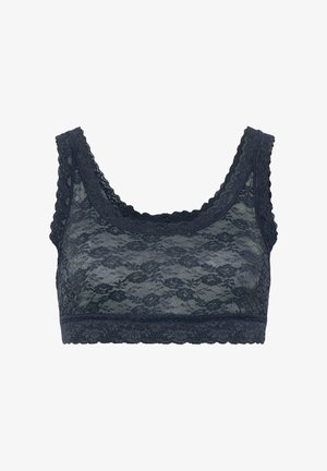 Tume sinine pitsist bralet, millel on lilleline muster, laiad sakilised servad ja pehme tekstuur. Omab sügavat kaelust ja pole polsterdatud.