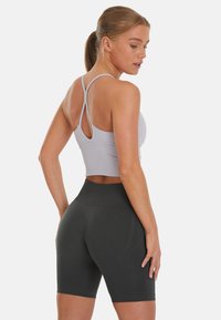SQUATPROOF REPOSE ACTIVE  - Top - iris
