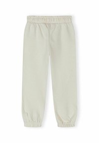Pantalon de jogging beige clair avec taille et chevilles élastiques, poignets froncés, présenté sur un fond blanc.