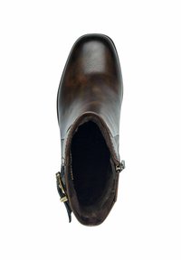 Bottines en cuir brun avec une texture lisse, un bout pointu et un motif de grain subtil. Présentent une boucle sur le côté et un intérieur sombre et duveteux.